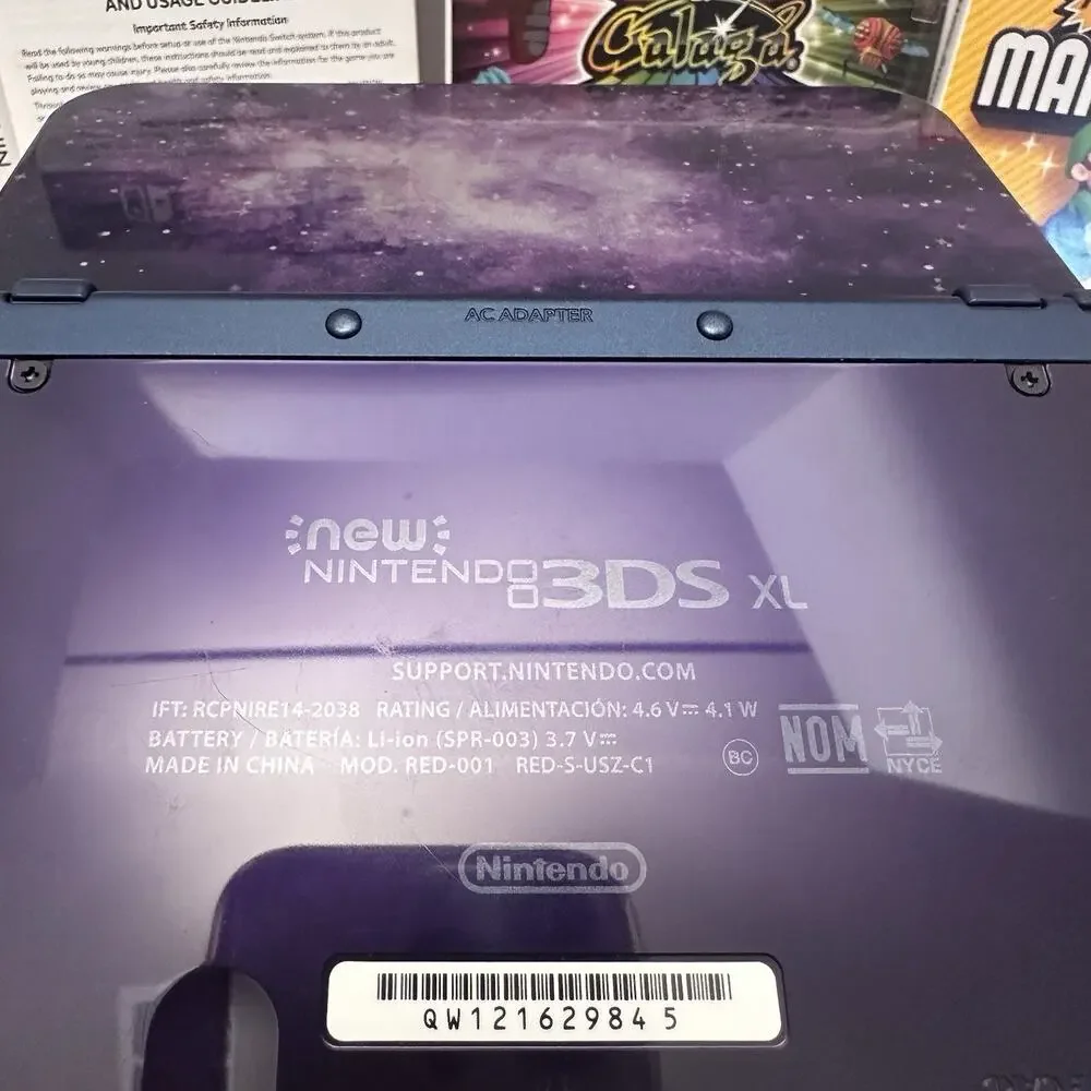 Nintendo New 3DS XL Purple Galaxy Edition - Charger, Stylus, Manual & 4 Games